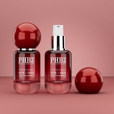 30 ml / 1 oz Pustka butelka z czerwonym szklanym serum kosmetycznym z okrągłą czapką kulkową, kolorystyczny OEM ODM opakowanie do pielęgnacji skóry do oleju eterycznego