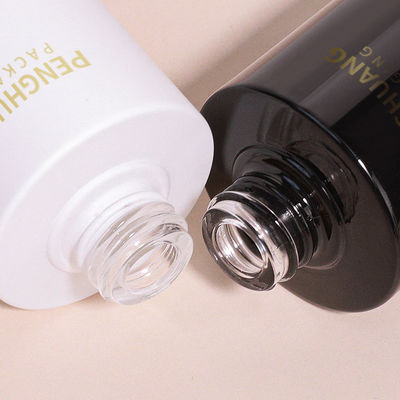 Okrągła szklana butelka z zakraplaczem z niestandardowym logo zgodnie z wymaganiami klienta