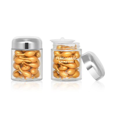 Okrągły 100g szklany pojemnik na kapsułki z różową złotą nakrętką Sliver Cap Glass Jar Packaing