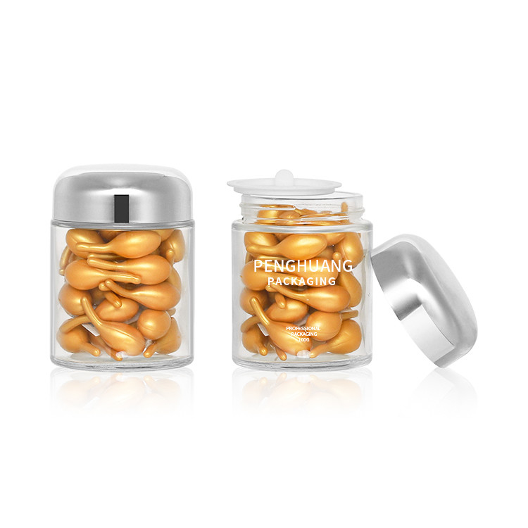 Okrągły 100g szklany pojemnik na kapsułki z różową złotą nakrętką Sliver Cap Glass Jar Packaing