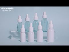 Szklana butelka z kroplomierzem oleju